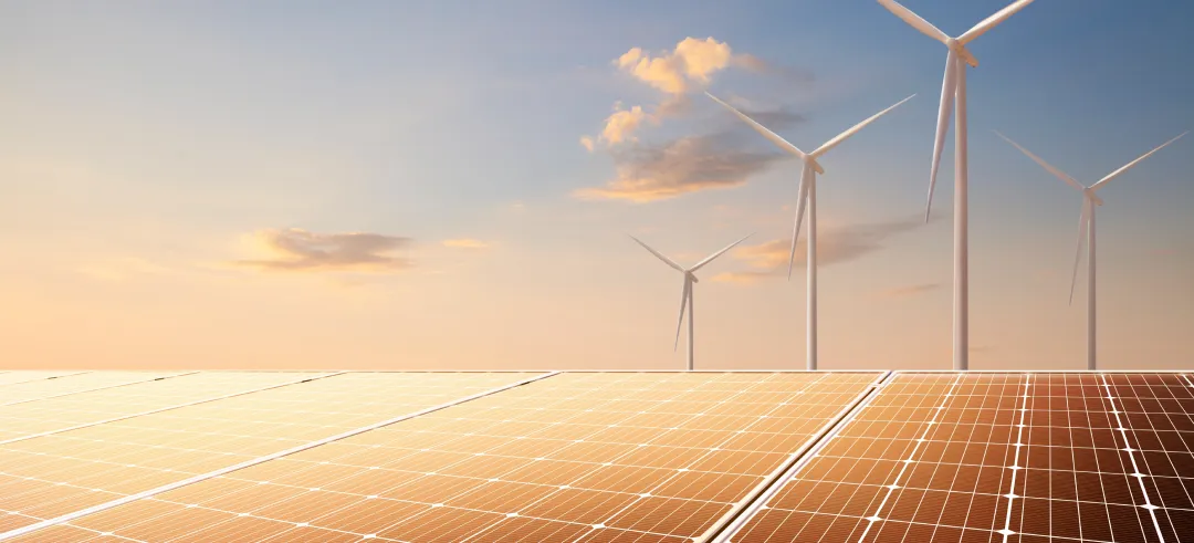 Placas solares y de fondo molinos de viento